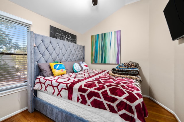 3002 Ashford Oak Dr, Houston, TX 77082 - bedroom with baseboards, wood finished floors, vaulted ceiling, and a ceiling fan