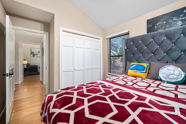 3002 Ashford Oak Dr, Houston, TX 77082 - bedroom with wood finished floors, vaulted ceiling, and a closet
