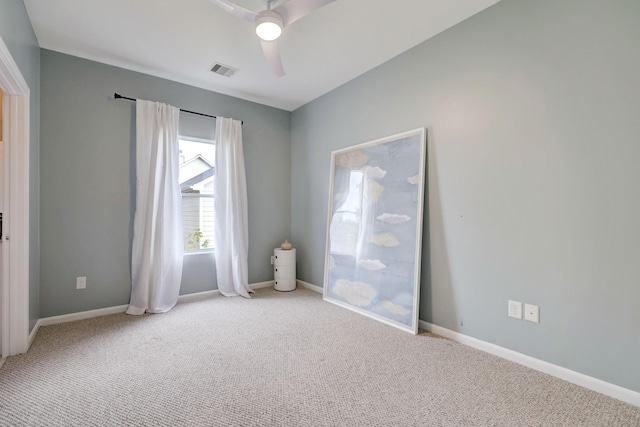 1540 Lawrence St, Houston, TX 77008 - spare room featuring light carpet, ceiling fan, and baseboards