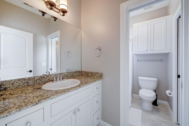 1540 Lawrence St, Houston, TX 77008 - bathroom featuring vanity, toilet, baseboards, and tile patterned flooring