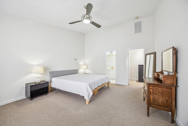 2720 La Branch St, Houston, TX 77004 - bedroom with light colored carpet, baseboards, and ensuite bath