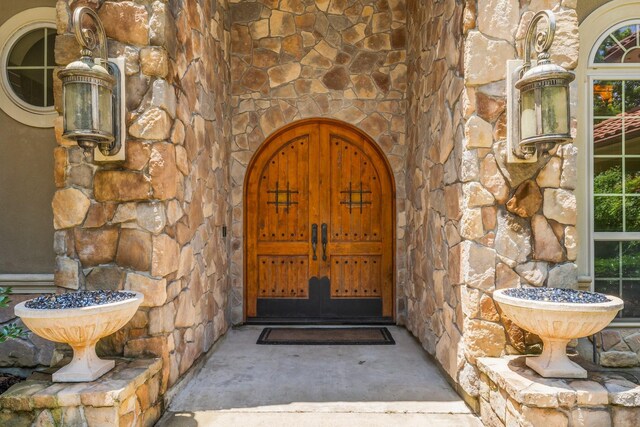 4022 Hidden Winds Dr, Spring, TX 77386 - property entrance with stone siding