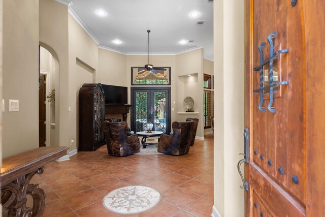 4022 Hidden Winds Dr, Spring, TX 77386 - tiled foyer entrance with baseboards, ornamental molding, arched walkways, a ceiling fan, and recessed lighting