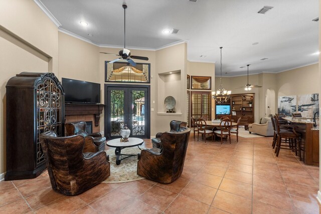 4022 Hidden Winds Dr, Spring, TX 77386 - living area with ceiling fan, crown molding, a chandelier, light tile patterned floors, and arched walkways