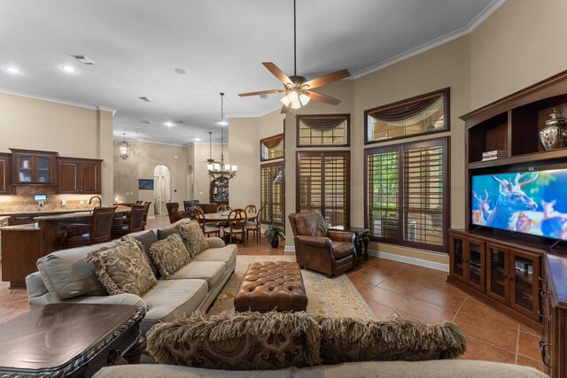 4022 Hidden Winds Dr, Spring, TX 77386 - living room with a chandelier, ornamental molding, recessed lighting, a ceiling fan, and tile patterned flooring