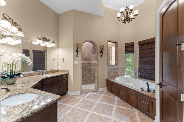 4022 Hidden Winds Dr, Spring, TX 77386 - bathroom with a high ceiling, vanity, a garden tub, a chandelier, and walk in shower