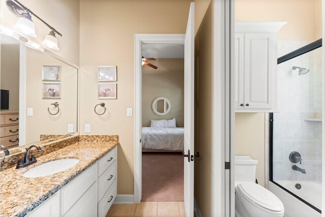 4022 Hidden Winds Dr, Spring, TX 77386 - full bath featuring vanity, ceiling fan, connected bathroom, tile patterned floors, and enclosed tub / shower combo