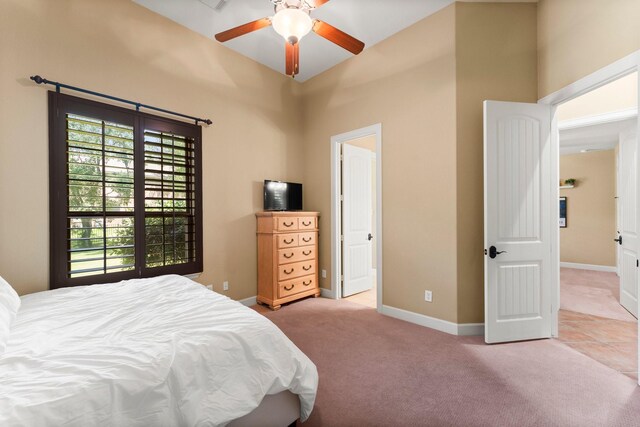 4022 Hidden Winds Dr, Spring, TX 77386 - carpeted bedroom with a towering ceiling and baseboards