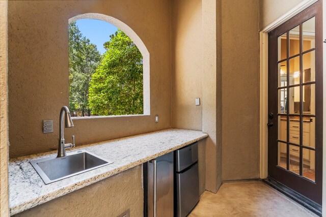 4022 Hidden Winds Dr, Spring, TX 77386 - view of patio featuring a sink and exterior kitchen