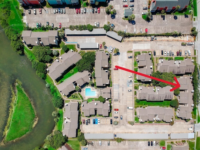 3220 69th St Unit B8, Galveston, TX 77551 - aerial view of property's location with a large body of water and a pool