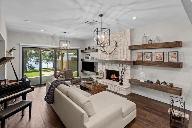 678 Sawmill St, Crockett, TX 75835 - living area featuring a chandelier, a fireplace, hardwood / wood-style flooring, recessed lighting, and baseboards