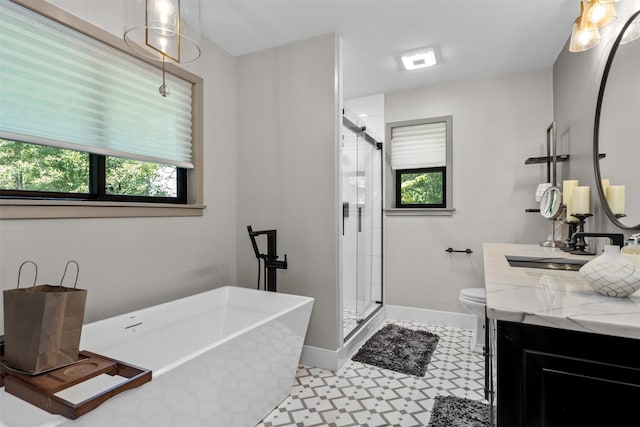678 Sawmill St, Crockett, TX 75835 - full bathroom featuring vanity, a freestanding tub, a stall shower, toilet, and tile patterned floors