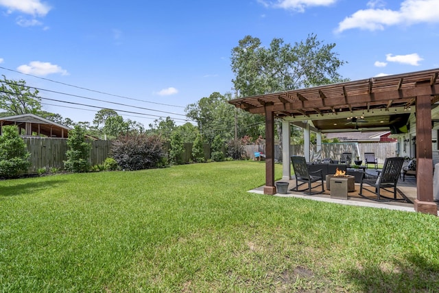 10207 Chatterton Dr, Houston, TX 77043 - view of yard with a fire pit, a pergola, a patio area, and a ceiling fan
