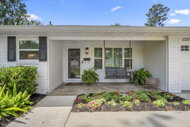 10207 Chatterton Dr, Houston, TX 77043 - entrance to property featuring brick siding and covered porch