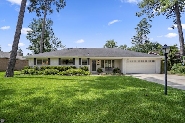 10207 Chatterton Dr, Houston, TX 77043 - ranch-style house featuring an attached garage, brick siding, concrete driveway, and a front lawn
