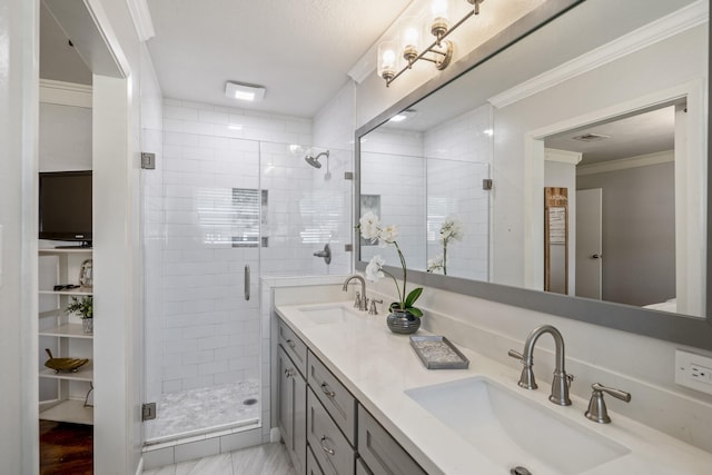 10207 Chatterton Dr, Houston, TX 77043 - full bath with a shower stall, double vanity, and crown molding