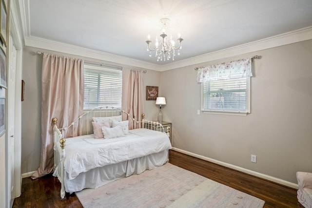 10207 Chatterton Dr, Houston, TX 77043 - bedroom featuring crown molding, a chandelier, baseboards, and wood finished floors