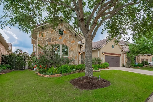7 Edgemont Ct, Fulshear, TX 77441 - view of front of house with stone siding, an attached garage, a front yard, and driveway