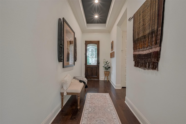 7 Edgemont Ct, Fulshear, TX 77441 - entryway featuring dark wood-style flooring, crown molding, baseboards, and a raised ceiling