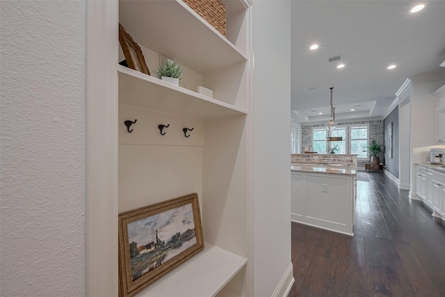 7 Edgemont Ct, Fulshear, TX 77441 - mudroom featuring recessed lighting, dark wood-style floors, baseboards, and a raised ceiling