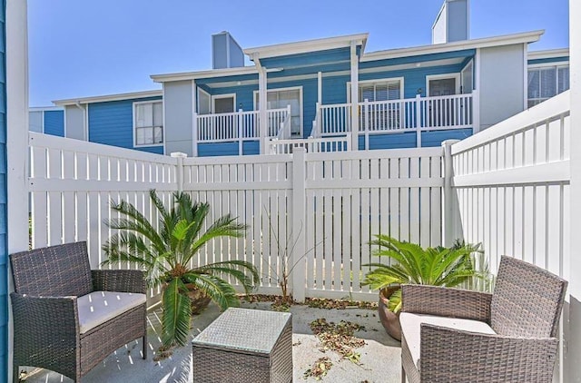 3506 Cove View Blvd Unit 1005, Galveston, TX 77554 - fenced backyard featuring a patio