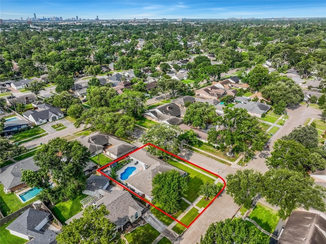963 Thornton Rd, Houston, TX 77018 - aerial view of residential area featuring property boundaries highlighted, city skyline, and a pool