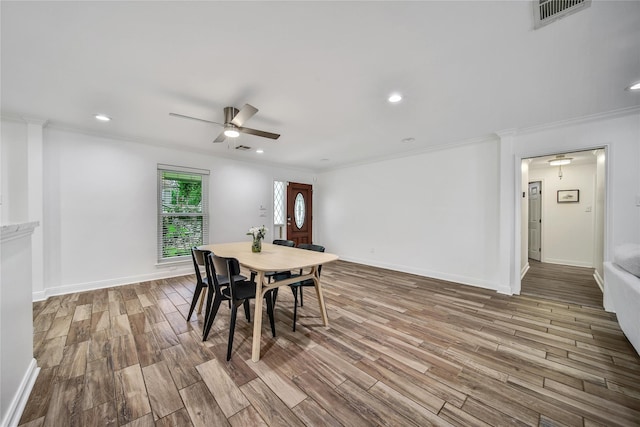 963 Thornton Rd, Houston, TX 77018 - dining area featuring ceiling fan, wood finished floors, ornamental molding, baseboards, and recessed lighting