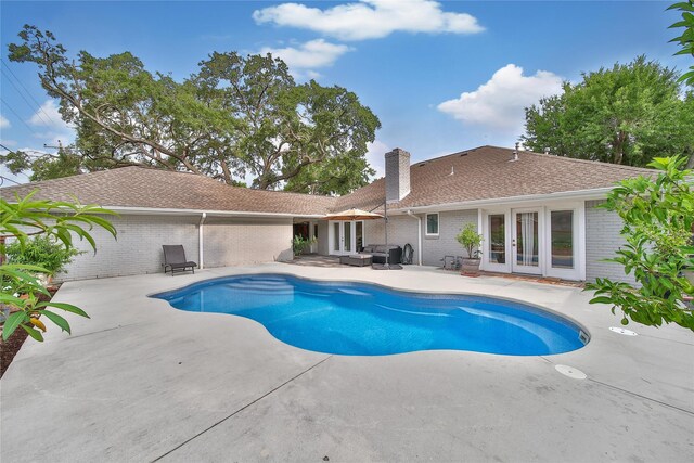 963 Thornton Rd, Houston, TX 77018 - view of swimming pool with french doors, a patio area, and an outdoor hangout area
