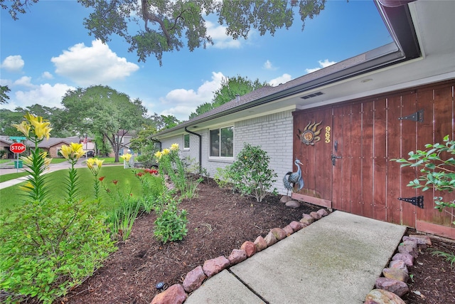 963 Thornton Rd, Houston, TX 77018 - property entrance featuring brick siding