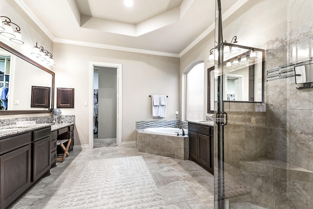 27511 Becketts Knoll Ct, Katy, TX 77494 - bathroom with vanity, a garden tub, a shower stall, a raised ceiling, and marble finish floors