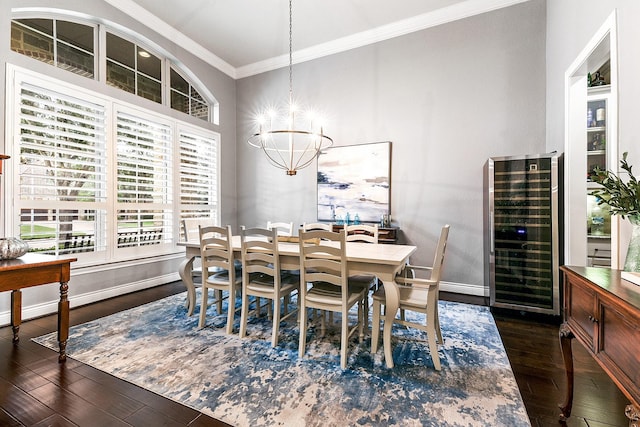 27511 Becketts Knoll Ct, Katy, TX 77494 - dining area featuring beverage cooler, crown molding, dark wood-type flooring, a chandelier, and baseboards