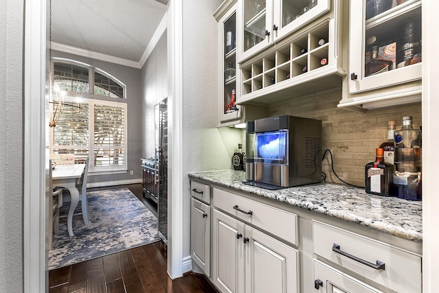 27511 Becketts Knoll Ct, Katy, TX 77494 - kitchen featuring ornamental molding, dark wood-type flooring, light stone countertops, glass insert cabinets, and baseboards