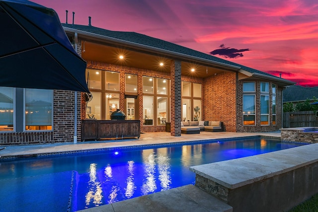 27511 Becketts Knoll Ct, Katy, TX 77494 - view of swimming pool featuring an outdoor hangout area, a patio, and a pool with connected hot tub