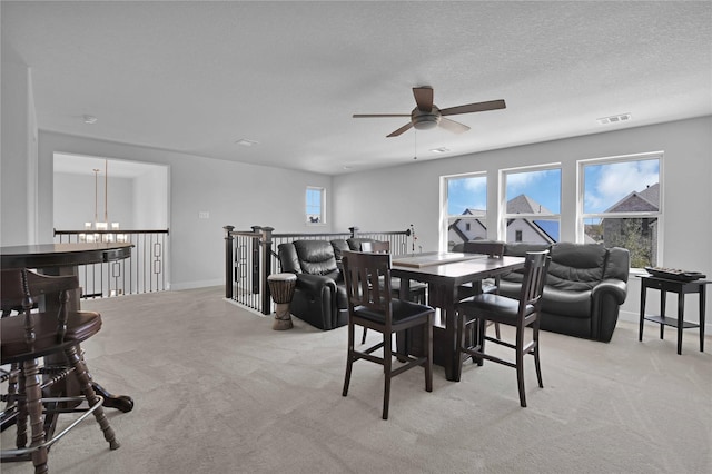 11930 Mccallister Run Dr, Humble, TX 77346 - dining area with light carpet, a ceiling fan, and baseboards