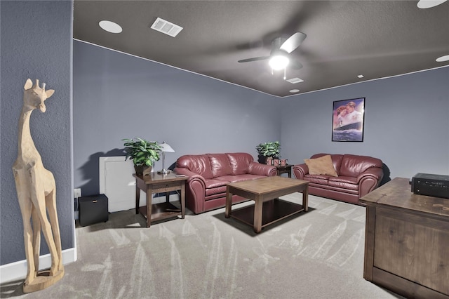 11930 Mccallister Run Dr, Humble, TX 77346 - living area featuring carpet floors, ceiling fan, and baseboards