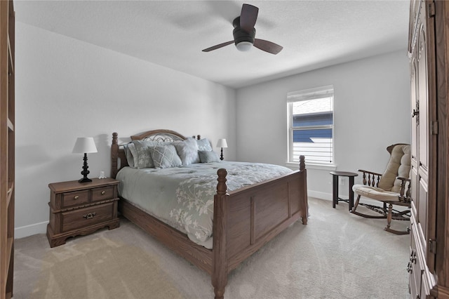 11930 Mccallister Run Dr, Humble, TX 77346 - bedroom featuring light carpet, baseboards, and ceiling fan