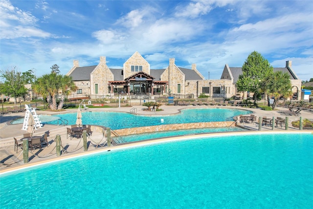 11930 Mccallister Run Dr, Humble, TX 77346 - community pool with a patio