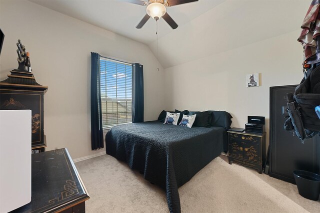 18110 Berry Garden Ln, Spring, TX 77379 - bedroom with light colored carpet, vaulted ceiling, a ceiling fan, and baseboards