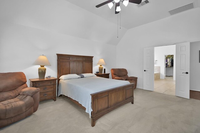 16923 Fondness Park Dr, Spring, TX 77379 - bedroom with vaulted ceiling, light colored carpet, ceiling fan, and ensuite bath