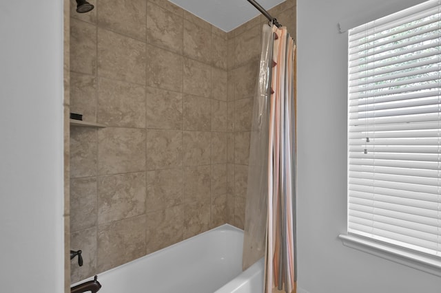 16923 Fondness Park Dr, Spring, TX 77379 - bathroom featuring shower / tub combo and plenty of natural light
