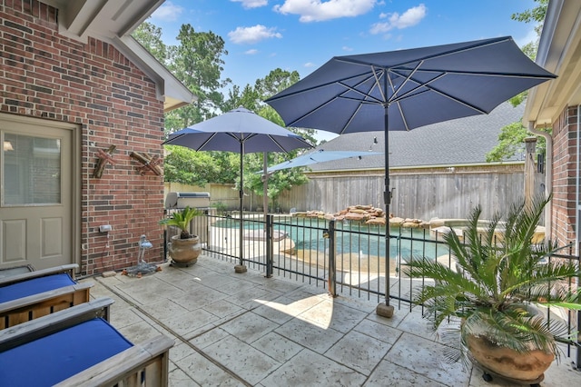 16923 Fondness Park Dr, Spring, TX 77379 - fenced backyard with a patio