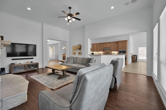 16923 Fondness Park Dr, Spring, TX 77379 - living room with a towering ceiling, ceiling fan, wood-type flooring, and recessed lighting