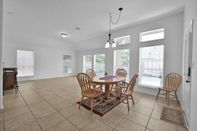 16923 Fondness Park Dr, Spring, TX 77379 - dining area featuring light tile patterned flooring, a chandelier, and lofted ceiling
