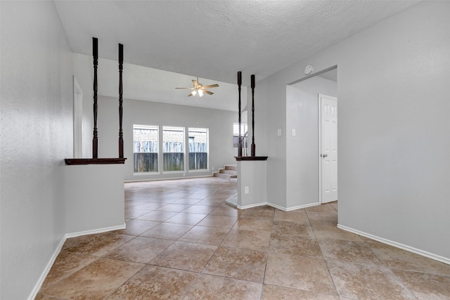 1535 Carbonear Dr, Channelview, TX 77530 - tiled spare room with ceiling fan, baseboards, and stairway