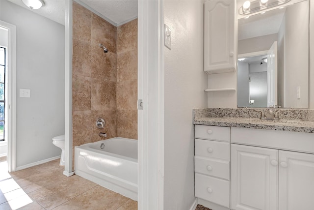 1535 Carbonear Dr, Channelview, TX 77530 - full bath with vanity, baseboards, tile patterned flooring, toilet, and bathing tub / shower combination
