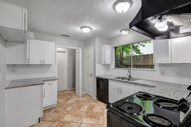 1535 Carbonear Dr, Channelview, TX 77530 - kitchen featuring black appliances, a sink, white cabinets, and a textured ceiling