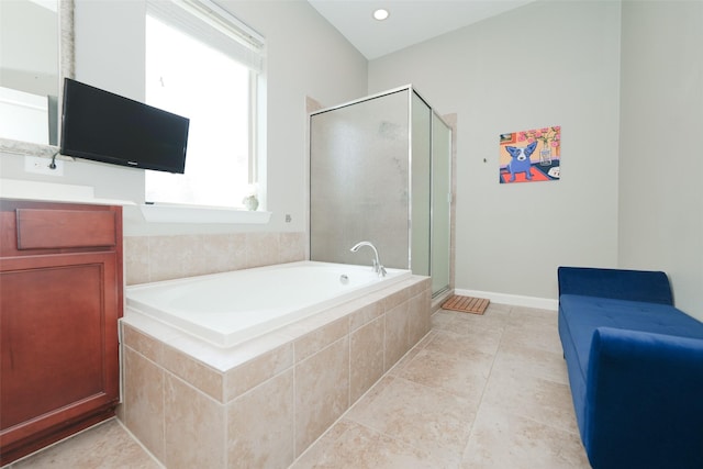 16826 Paynes Creek Dr, Cypress, TX 77433 - bathroom featuring a stall shower, a garden tub, vanity, and tile patterned floors