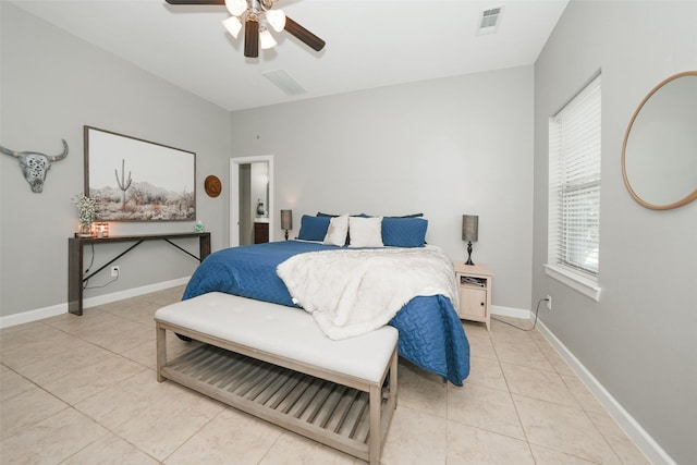 16826 Paynes Creek Dr, Cypress, TX 77433 - bedroom featuring light tile patterned floors, ceiling fan, and baseboards