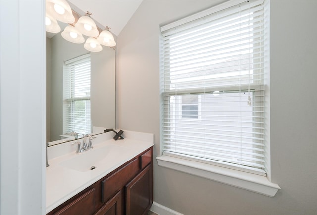 16826 Paynes Creek Dr, Cypress, TX 77433 - bathroom featuring lofted ceiling and vanity