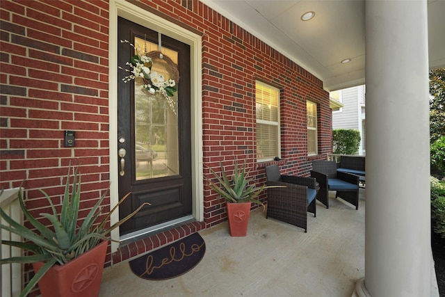 16826 Paynes Creek Dr, Cypress, TX 77433 - view of exterior entry featuring covered porch and brick siding
